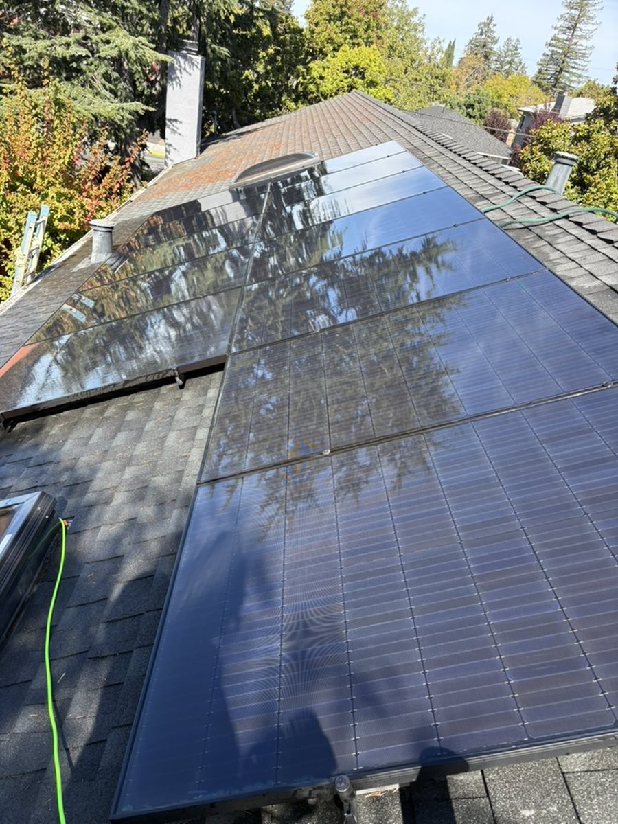 Cleaned rooftop solar panels on a shingle roof in San Mateo, CA
